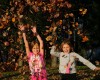 Take great photos of your kids having fun with autumn leaves!